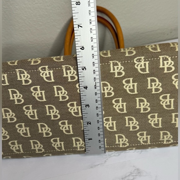 Dooney & Bourke Taupe Monogrammed Jacquard Tan Leather Trim Tassel Tote Handbag - Picture 11 of 11